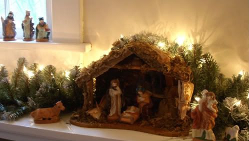Nativity Scene with wise men on a nearby window sill